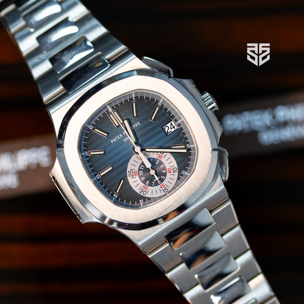 Patek Philippe Nautilus 5980/1A blue 2010 pre-owned — The Smiling Second, Melbourne
