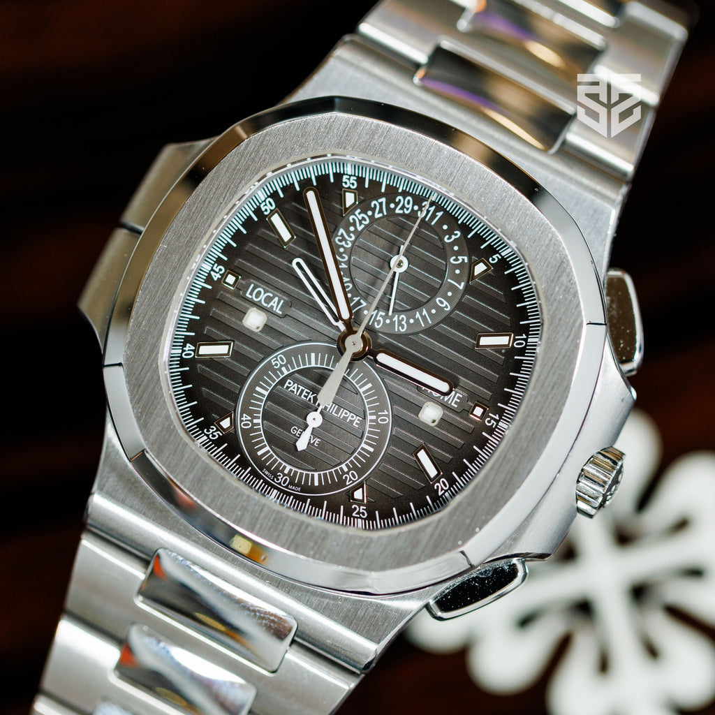 Patek Philippe Nautilus Travel Time Chronograph 5990/1A 2015 case and dial at an angle — The Smiling Second, Melbourne