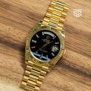Rolex Day-Date 40 Yellow Gold Onyx Baguette Diamond 228238 2024